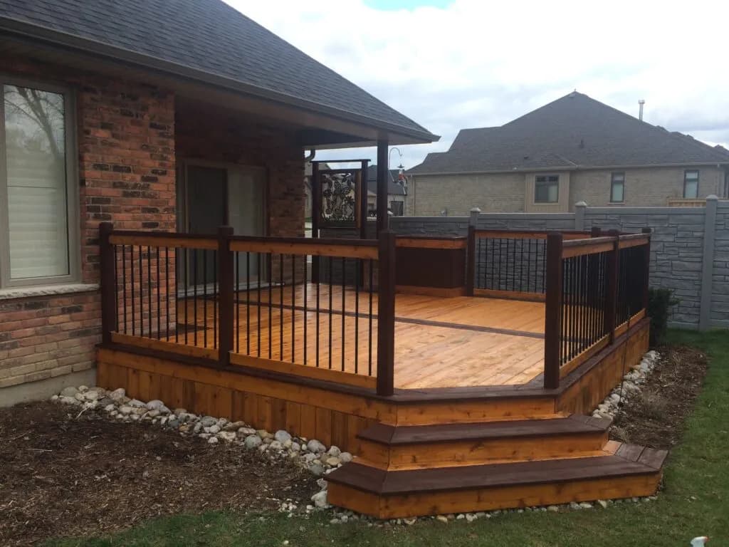 Deck boards with stain after professional washing by Deck Medic