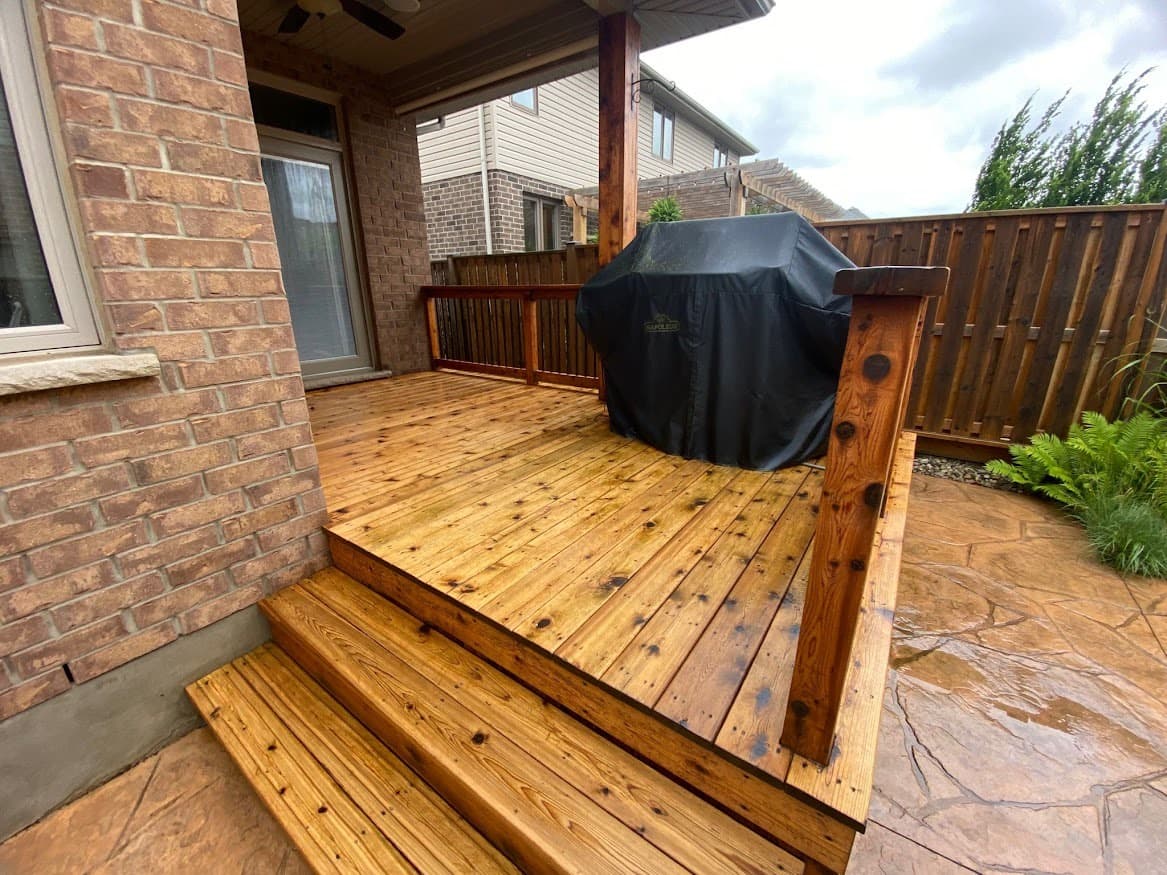 Professional power washing of deck before staining, Toronto ON